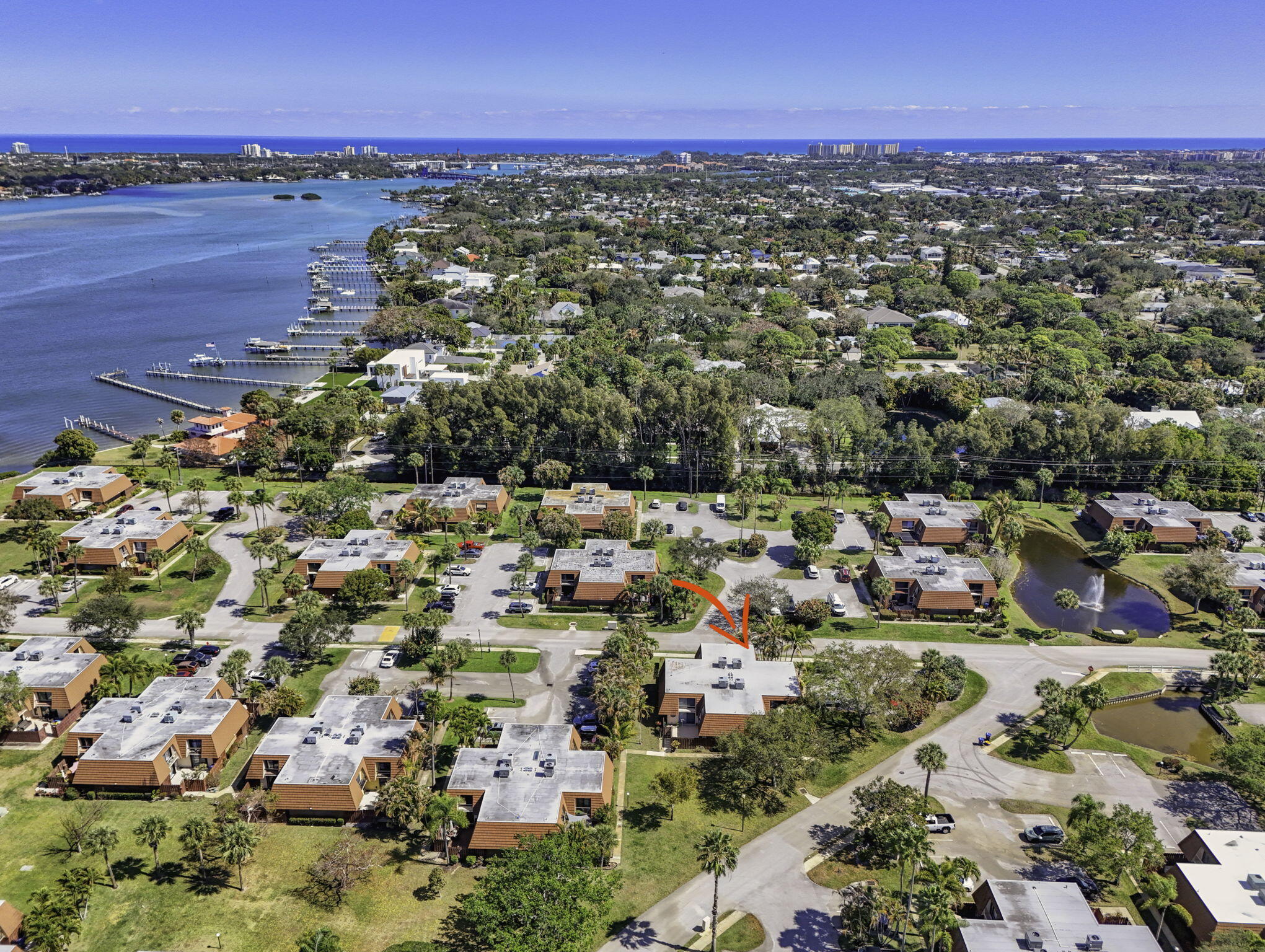 825 Center Street, Unit 9A Jupiter, FL 33458 - Photo 47 of 52 an aerial view of a city with lots of residential buildings