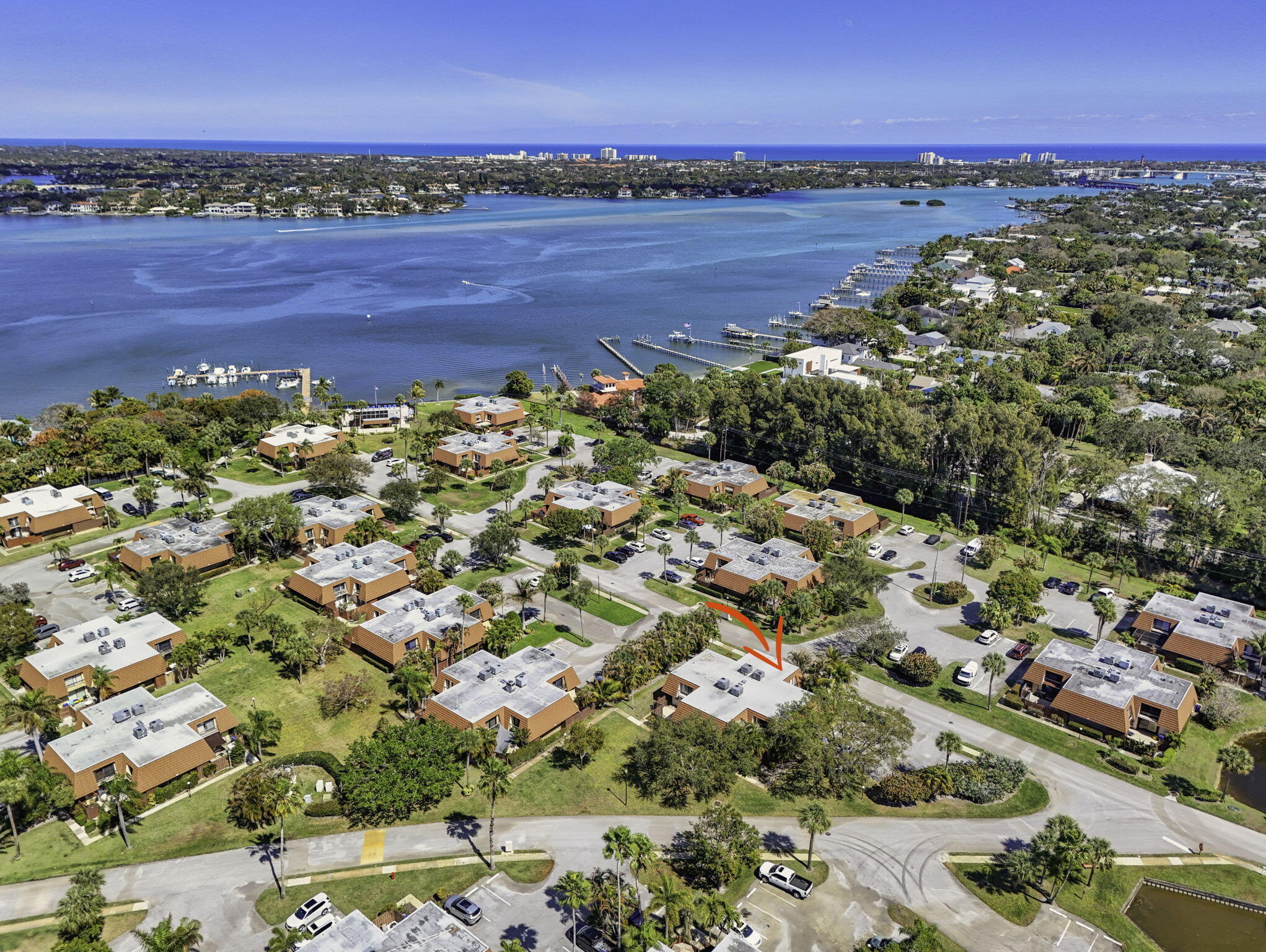 825 Center Street, Unit 9A Jupiter, FL 33458 - Photo 10 of 52 a view of a city and an ocean