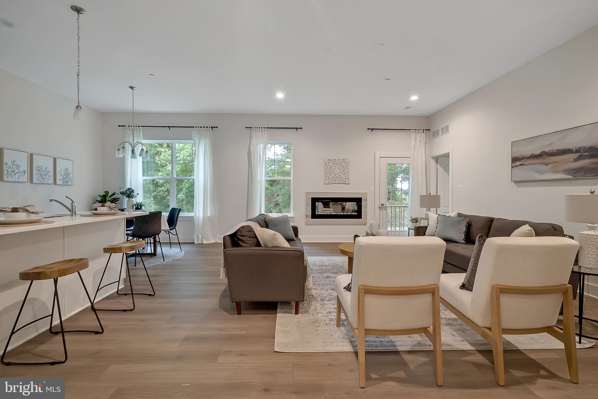 113 Gentle Slope Way Gettysburg, PA 17325 - Photo 6 of 28 a living room with fireplace furniture and a large window