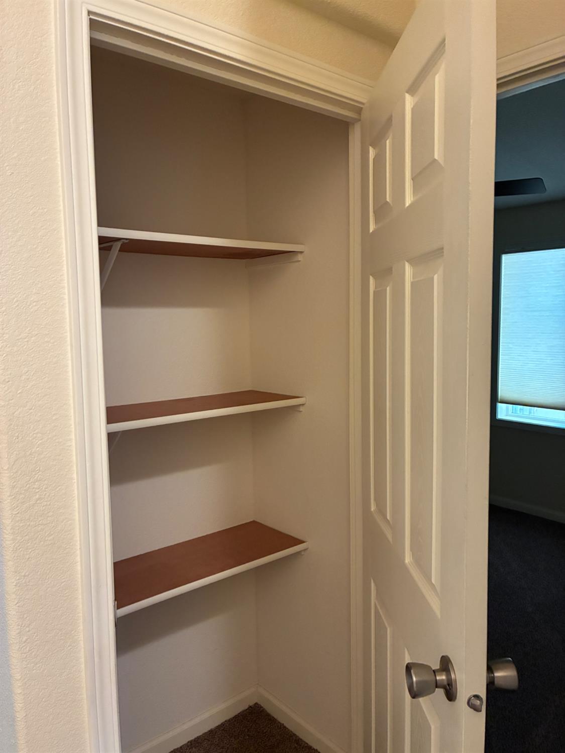 1155 Pease Road, Unit 408 Yuba City, CA 95991 - Photo 19 of 45 a view of walk in closet with empty racks