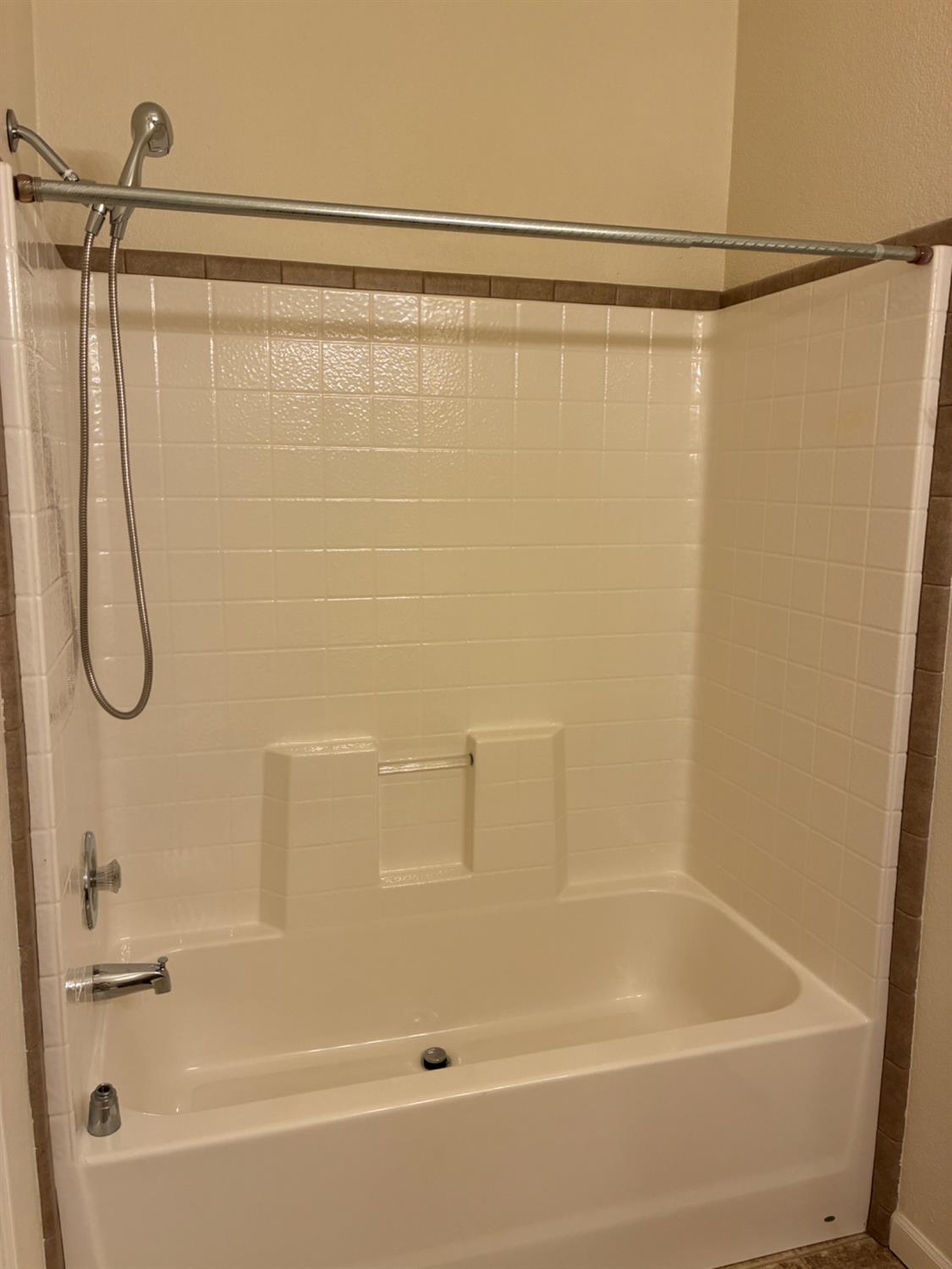 1155 Pease Road, Unit 408 Yuba City, CA 95991 - Photo 21 of 45 a bathroom with a shower and a bath tub