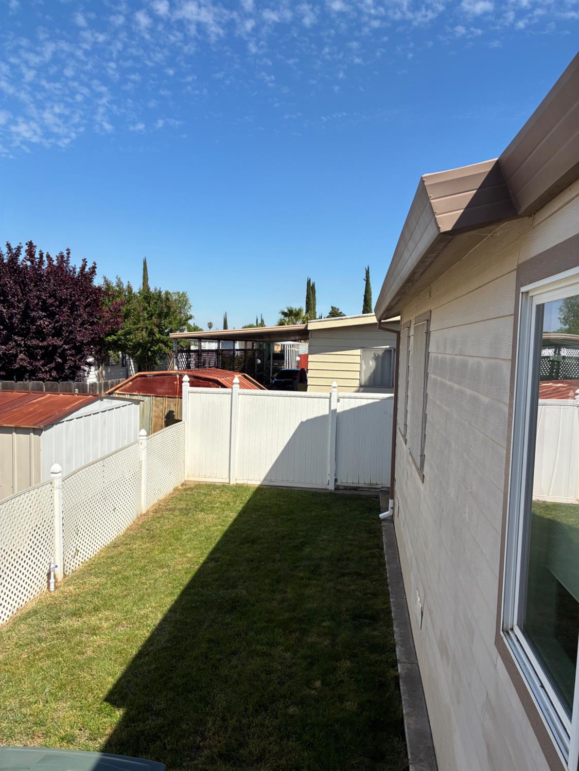 1155 Pease Road, Unit 408 Yuba City, CA 95991 - Photo 45 of 45 a view of balcony with floor to ceiling window and wooden floor