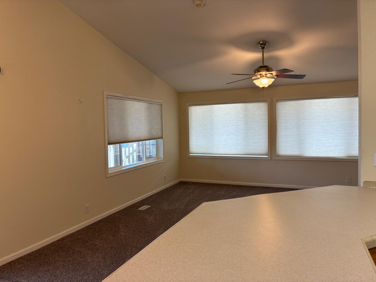1155 Pease Road, Unit 408 Yuba City, CA 95991 - Photo 7 of 45 a view of an empty room with a window