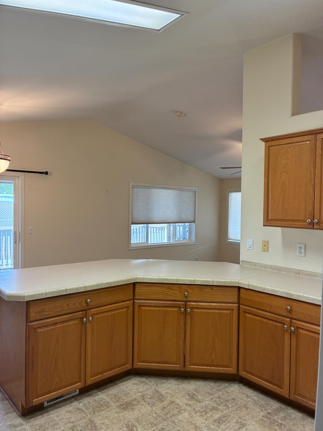 1155 Pease Road, Unit 408 Yuba City, CA 95991 - Photo 9 of 45 a kitchen with sink and cabinets
