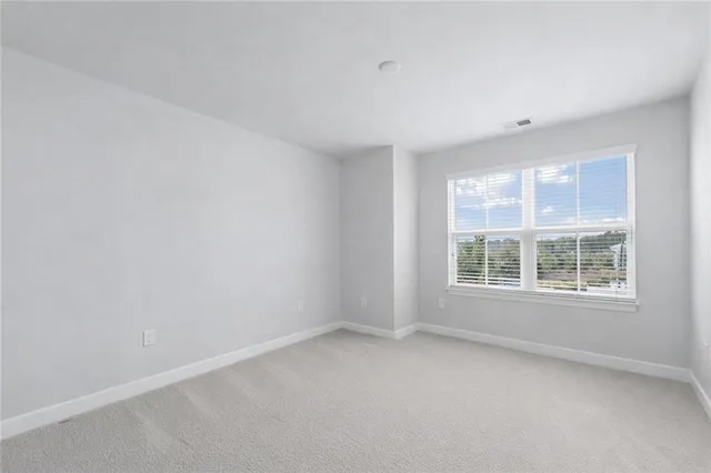 an empty room with a window