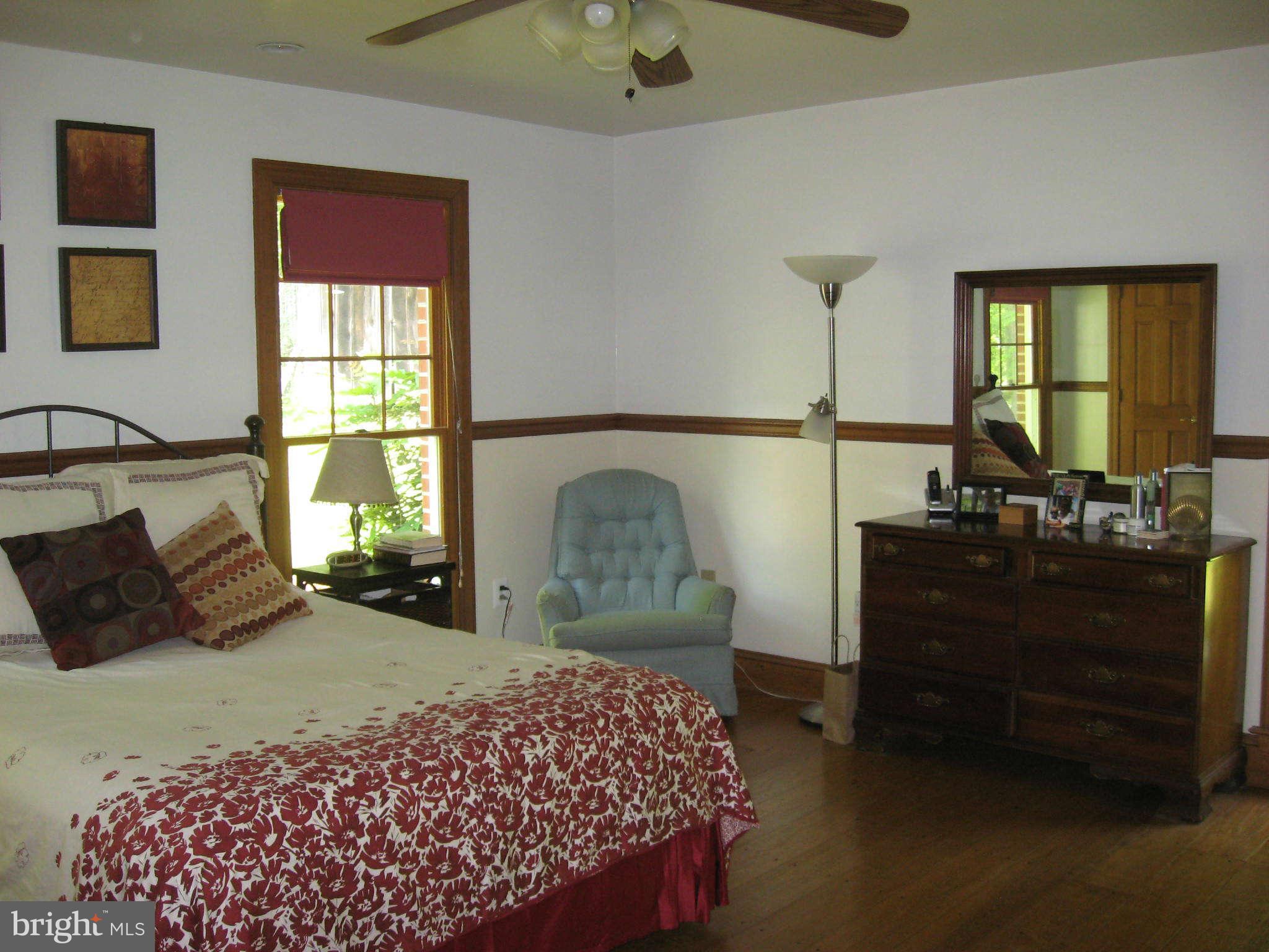 1590 Lottie Fowler Road Prince Frederick, MD 20678 - Photo 16 of 30 Master Bedroom w/pine floors