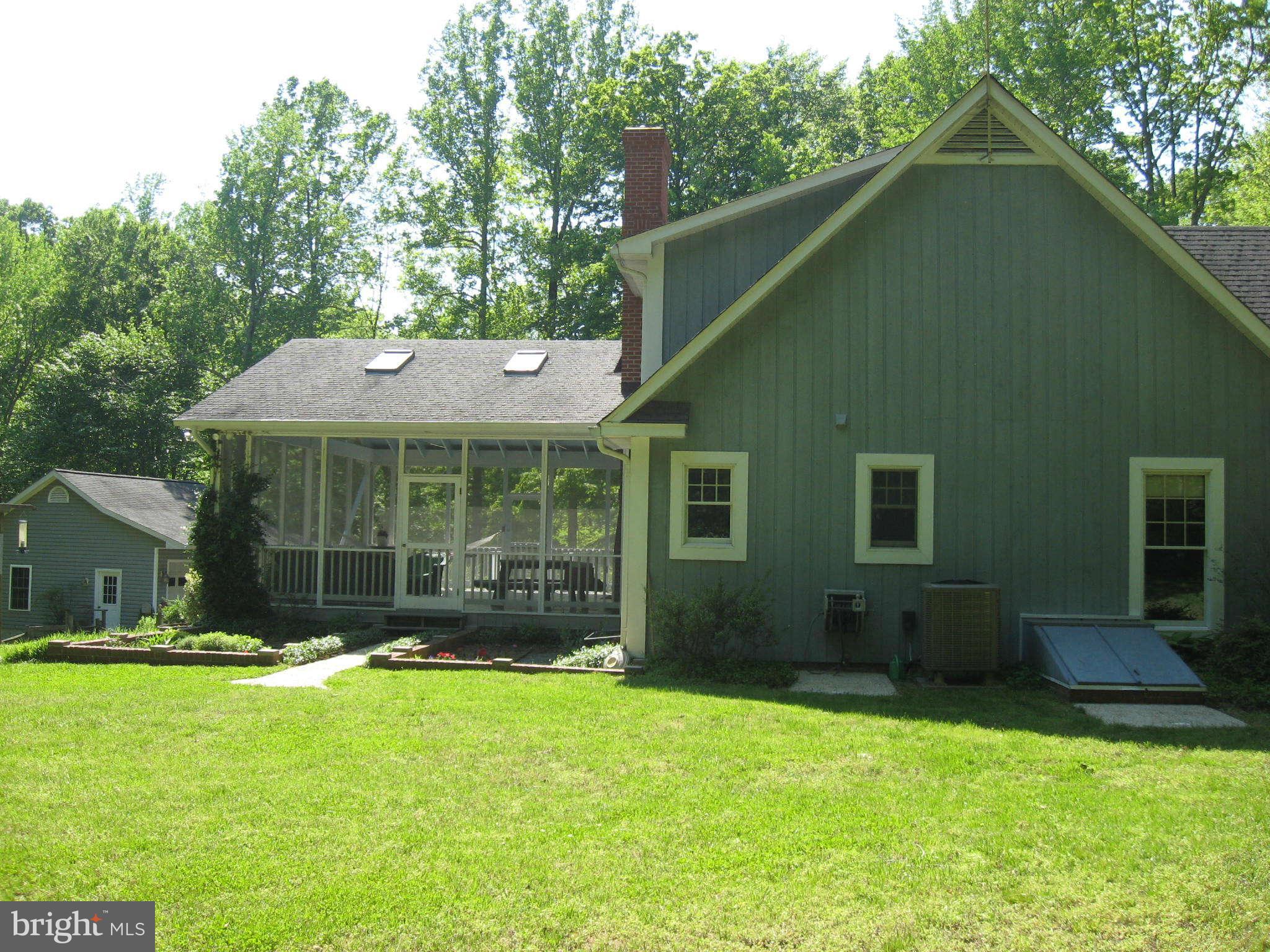 1590 Lottie Fowler Road Prince Frederick, MD 20678 - Photo 4 of 30 Exterior Side, Screened Porch