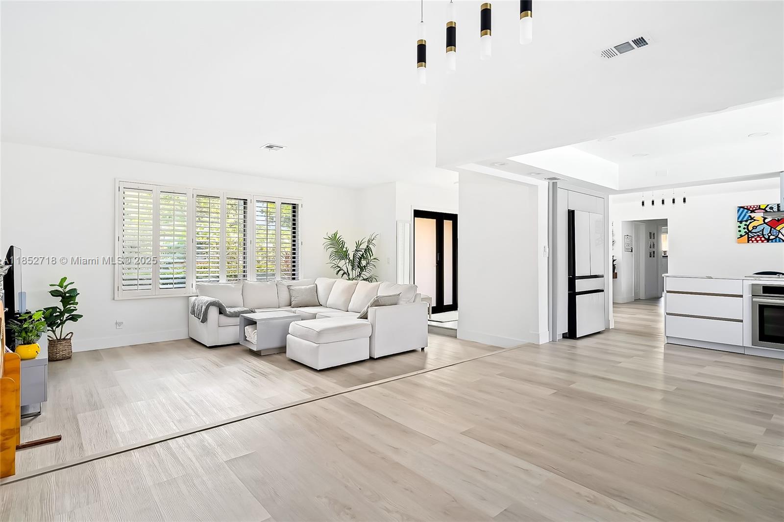 5100 Arthur Street Hollywood, FL 33021 - Photo 13 of 54 a living room with furniture and large windows