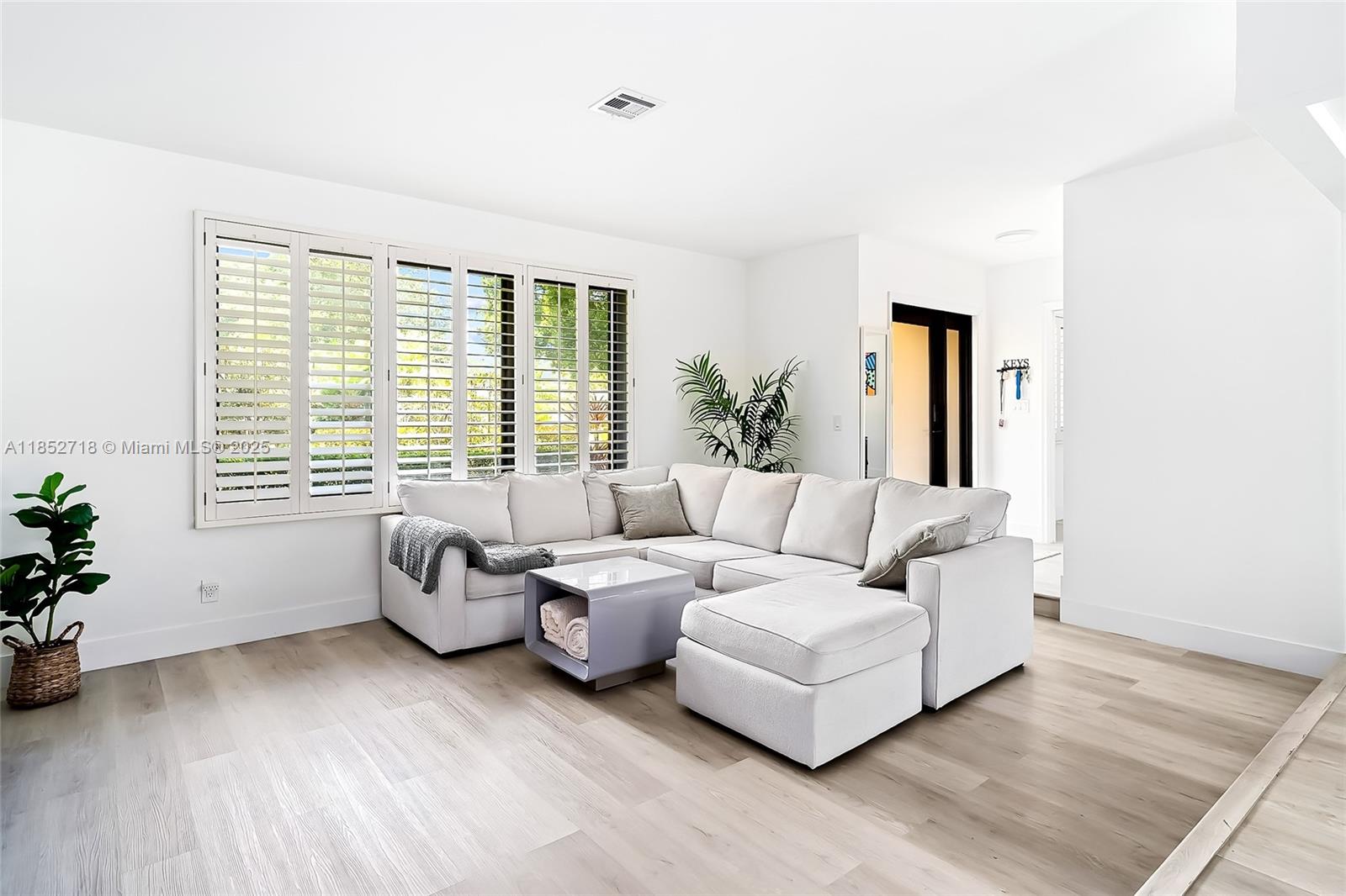5100 Arthur Street Hollywood, FL 33021 - Photo 15 of 54 a living room with furniture and windows