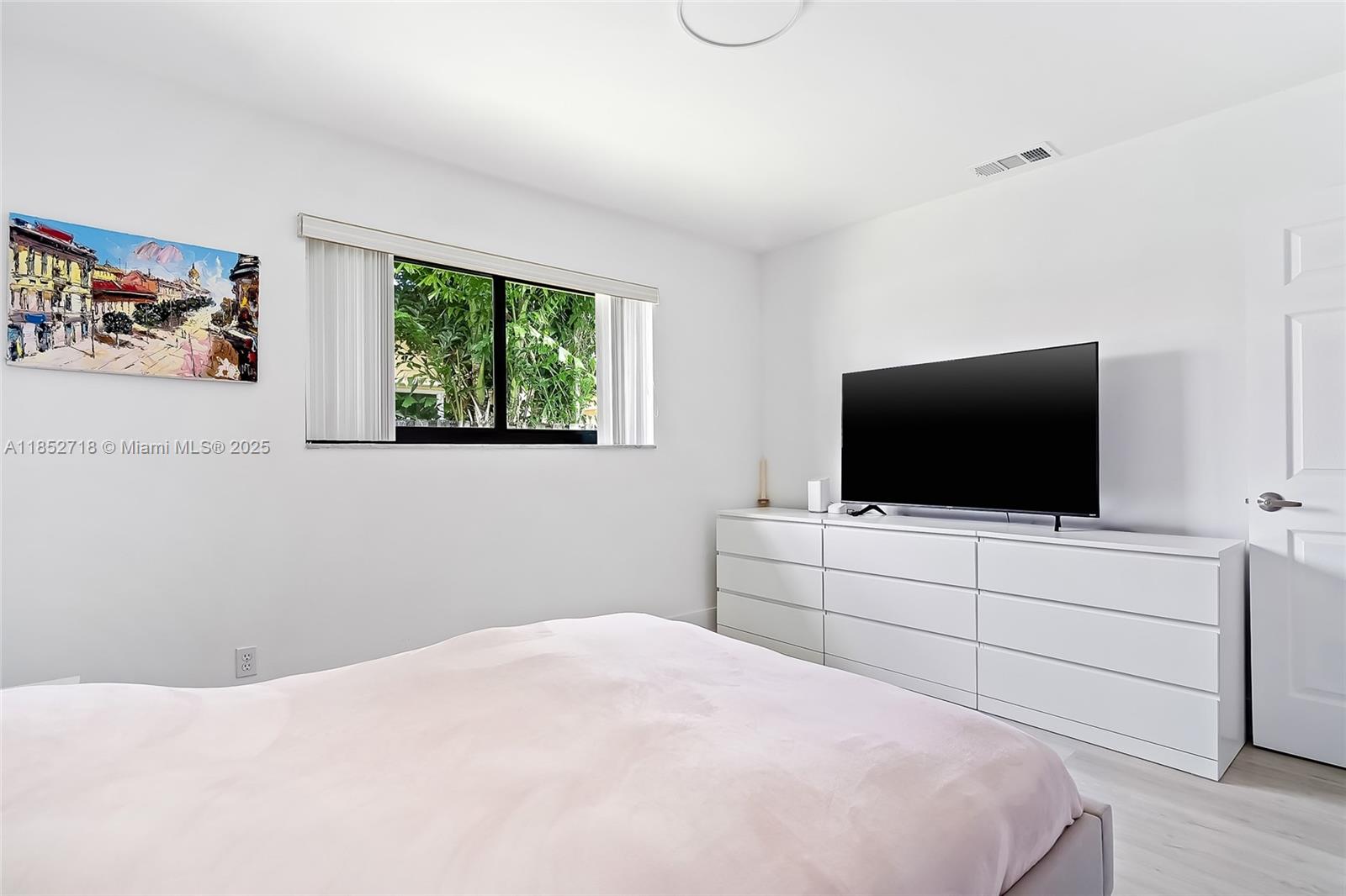 5100 Arthur Street Hollywood, FL 33021 - Photo 33 of 54 a bedroom with a bed and a flat screen tv