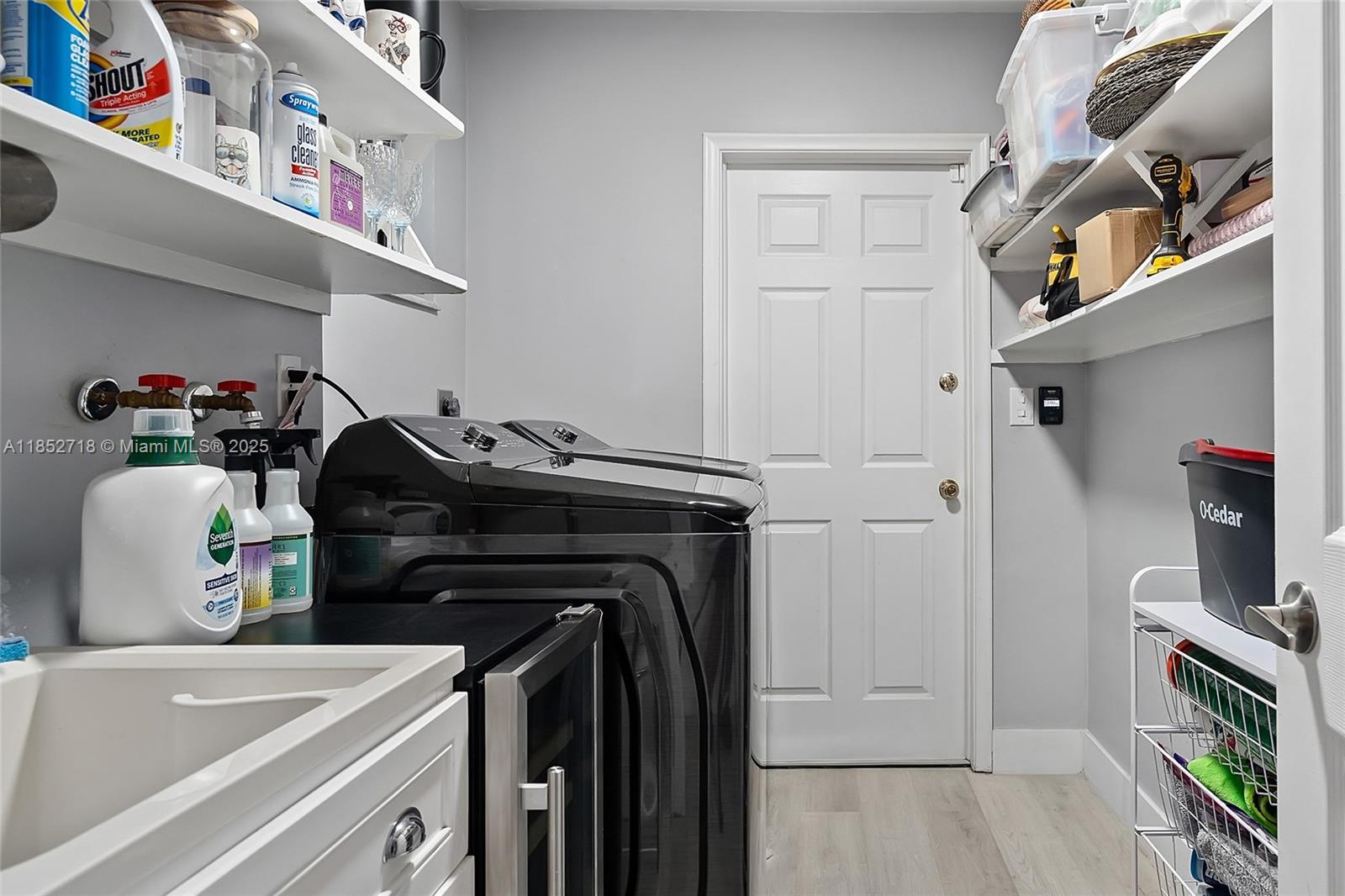 5100 Arthur Street Hollywood, FL 33021 - Photo 34 of 54 a utility room with dryer and washer