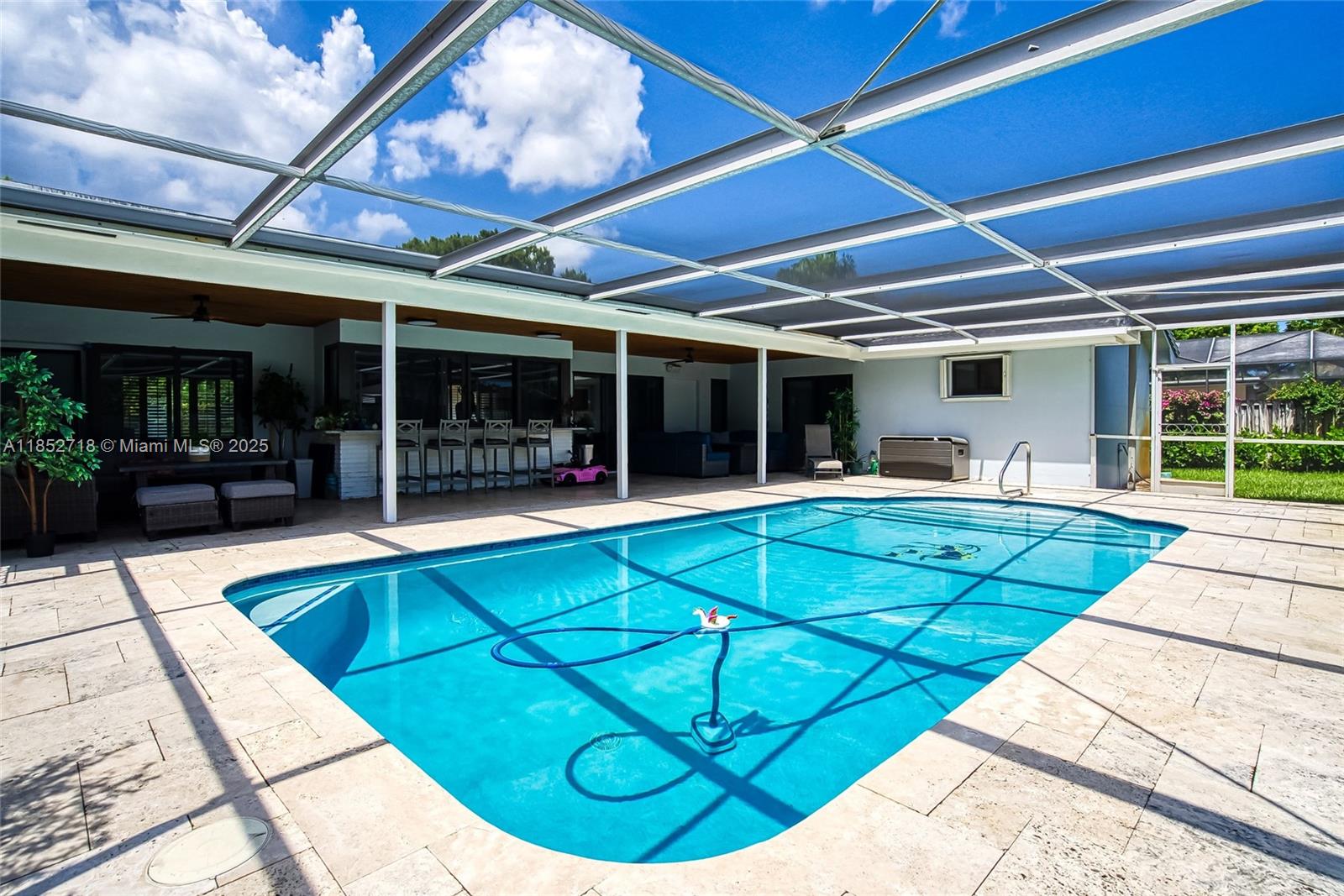 5100 Arthur Street Hollywood, FL 33021 - Photo 38 of 54 a view of a swimming pool with a patio