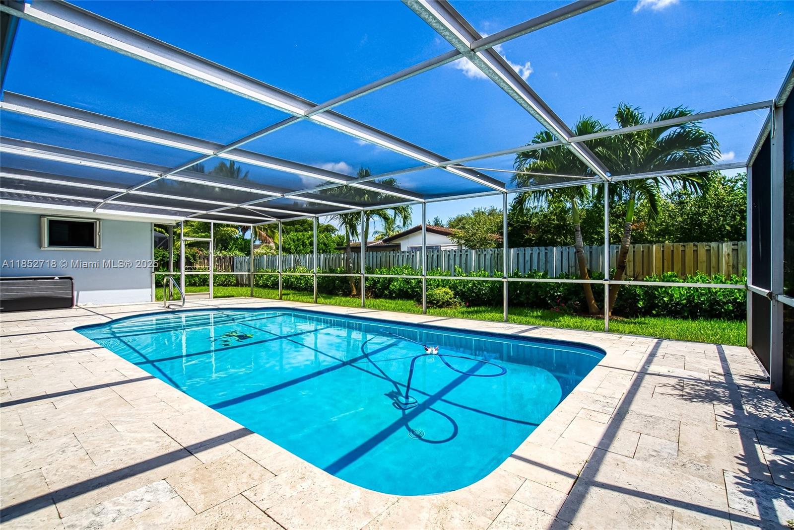 5100 Arthur Street Hollywood, FL 33021 - Photo 39 of 54 a view of a backyard with a swimming pool