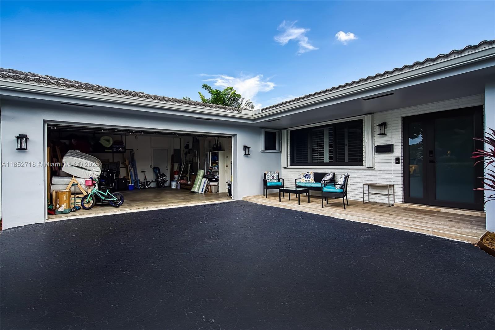 5100 Arthur Street Hollywood, FL 33021 - Photo 46 of 54 a view of a living room with a lot of stuff and hardwood floor