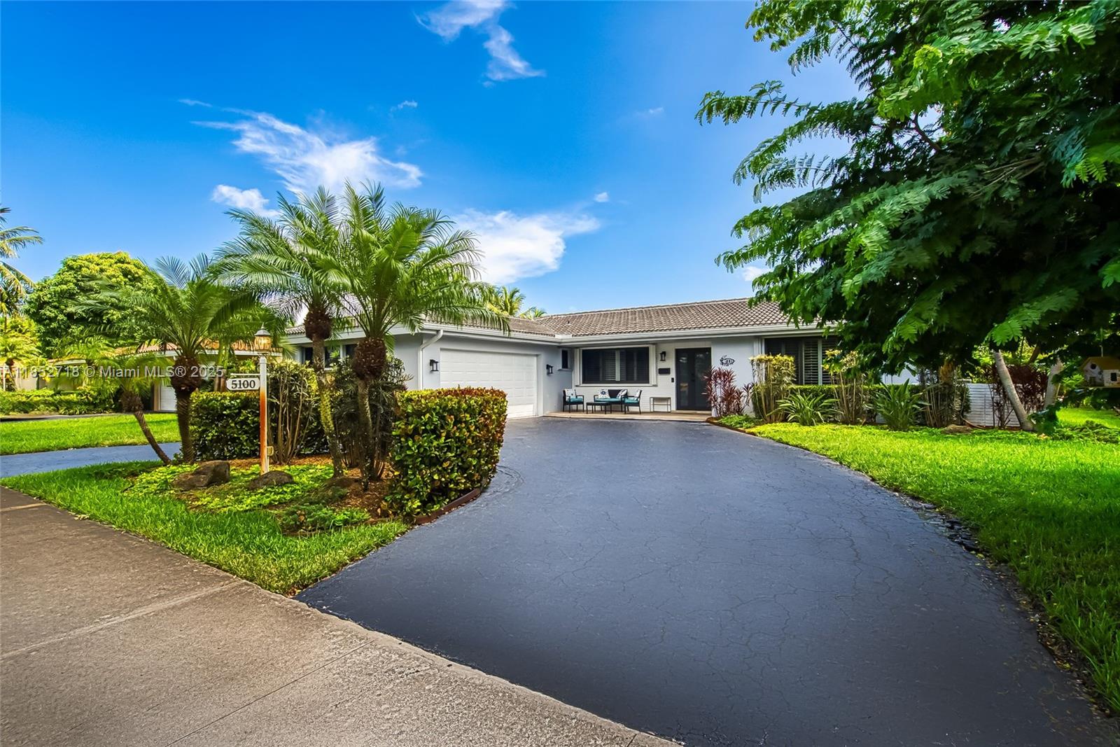 5100 Arthur Street Hollywood, FL 33021 - Photo 49 of 54 a front view of house with yard and green space
