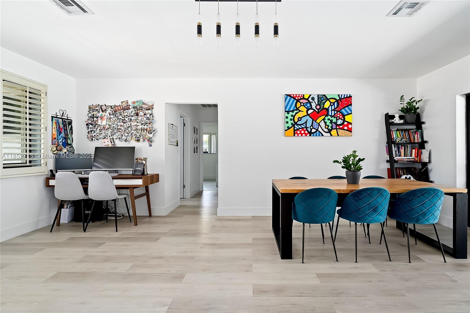 5100 Arthur Street Hollywood, FL 33021 - Photo 9 of 54 a workspace with furniture window and wooden floor