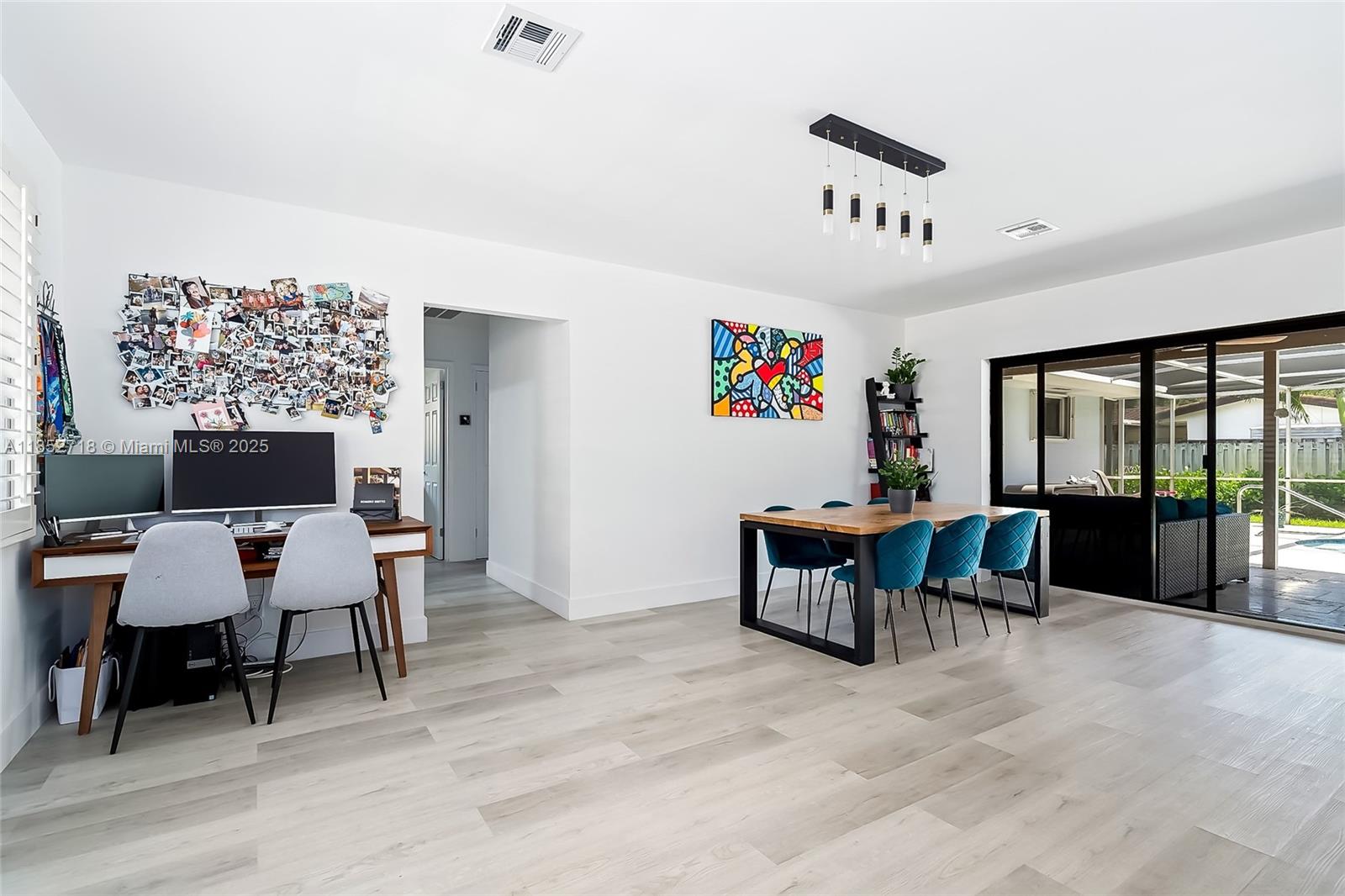 5100 Arthur Street Hollywood, FL 33021 - Photo 10 of 54 a living room with furniture and a large window