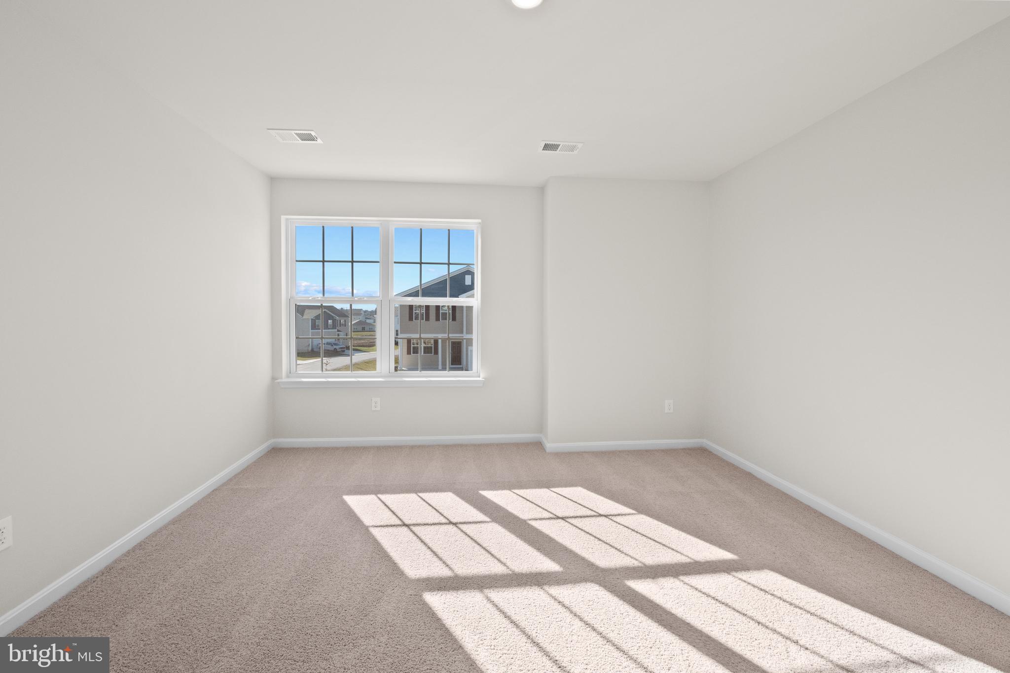348 Eclipse Street Ranson, WV 25438 - Photo 19 of 29 a view of a room that has a window in it