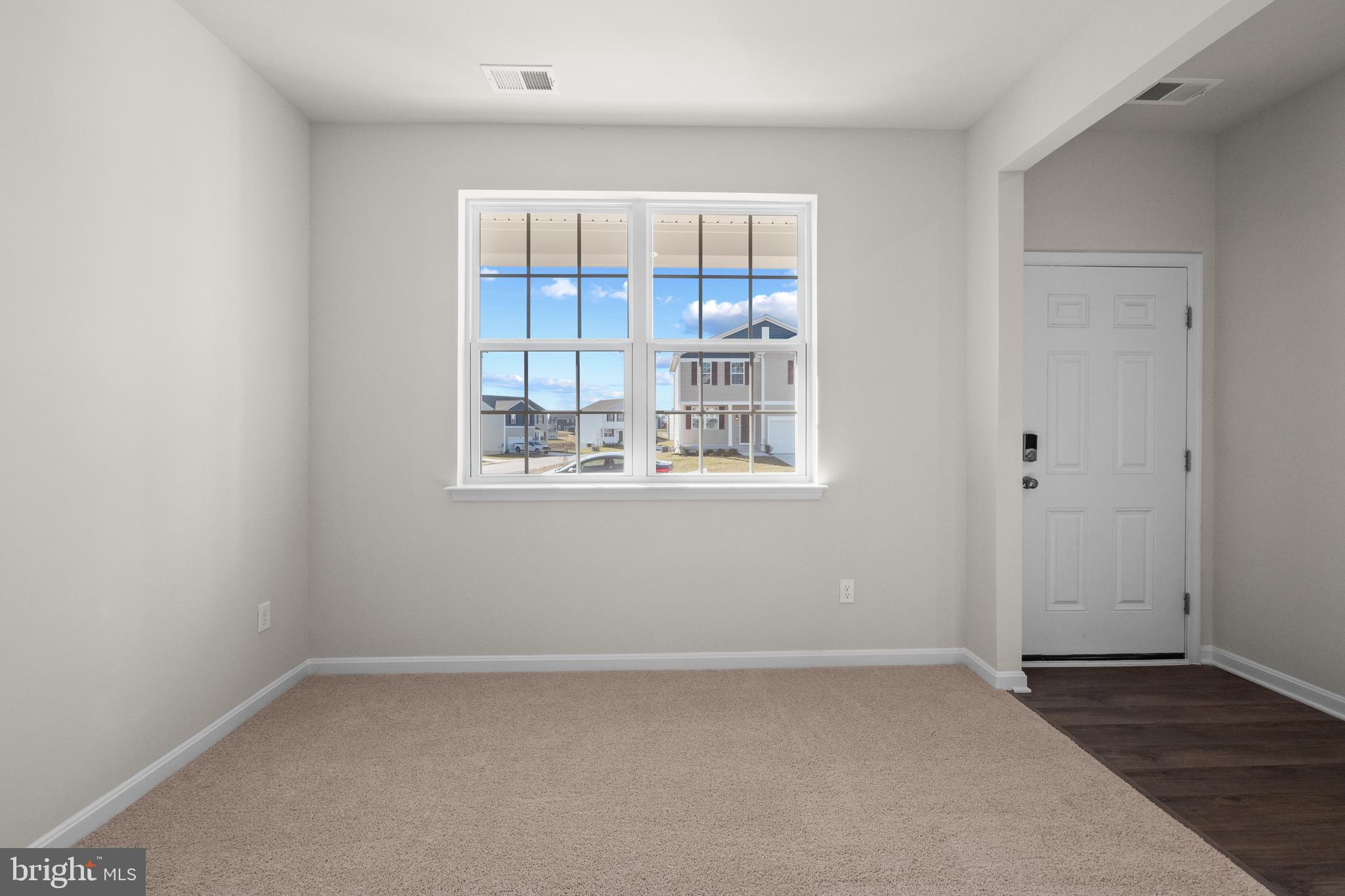 348 Eclipse Street Ranson, WV 25438 - Photo 3 of 29 a view of an empty room with a window