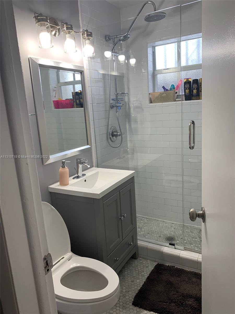 Flagami Miami, FL 33126 - Photo 15 of 21 a bathroom with a sink a toilet and shower