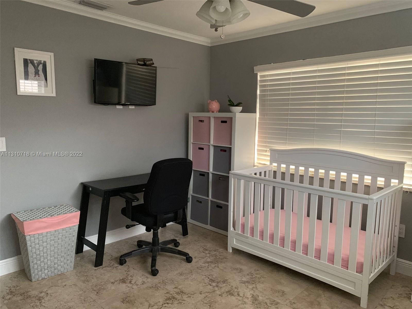 Flagami Miami, FL 33126 - Photo 3 of 21 a view of a workspace with furniture and a window