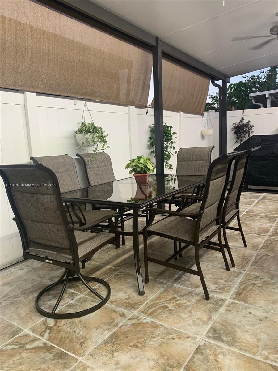 Flagami Miami, FL 33126 - Photo 4 of 21 a view of a porch with furniture and garden