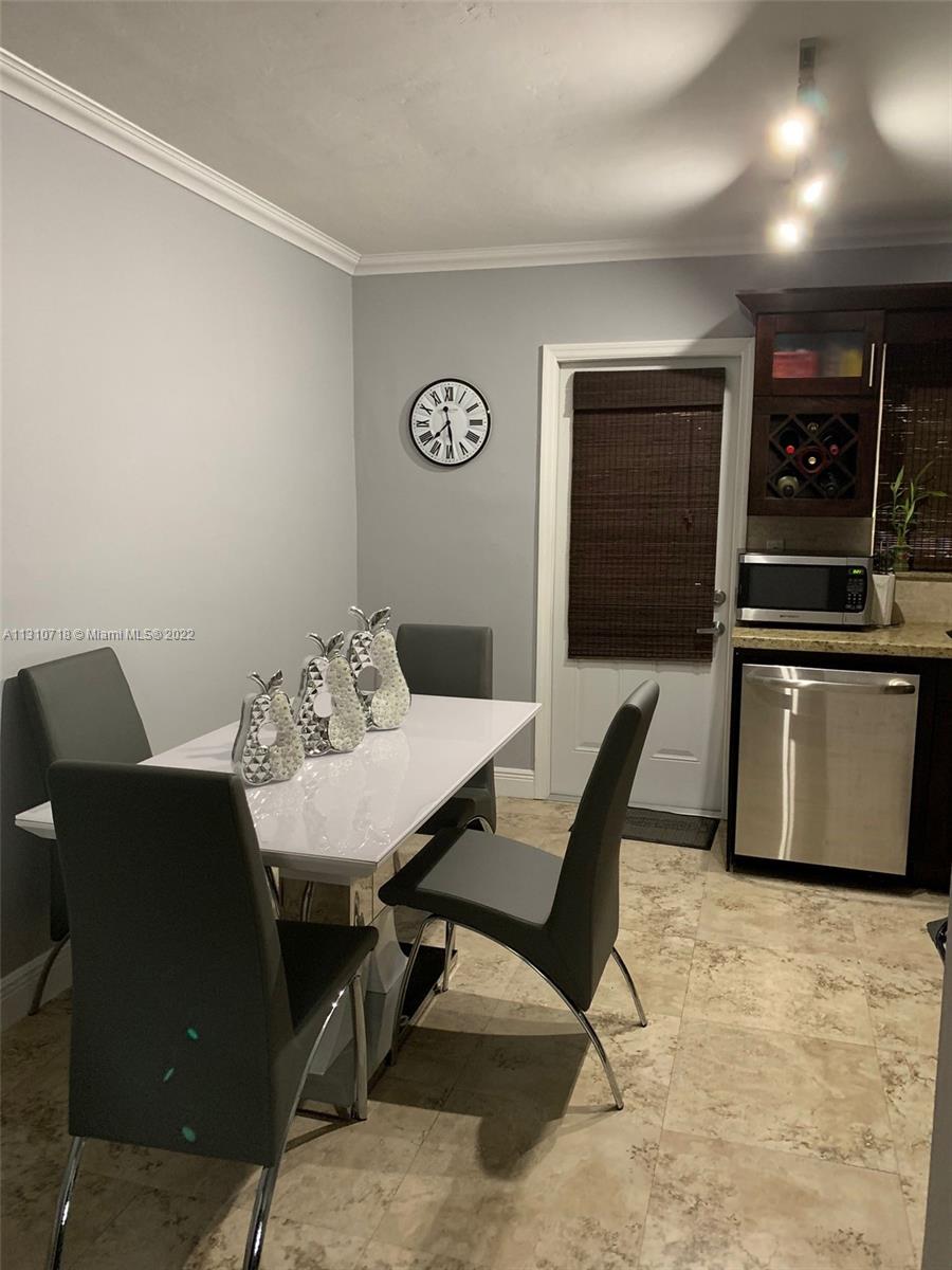 Flagami Miami, FL 33126 - Photo 10 of 21 a view of a dining room with furniture