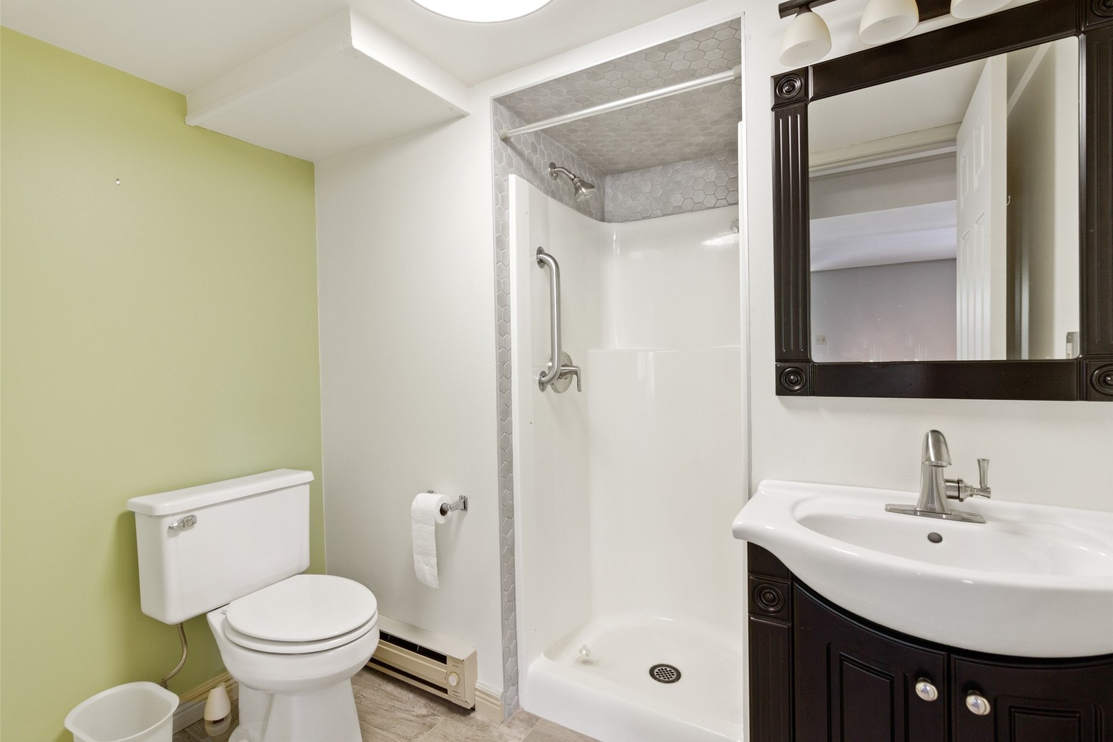 3390 North Jugtown Road Morris, IL 60450 - Photo 24 of 34 a bathroom with a sink toilet and shower