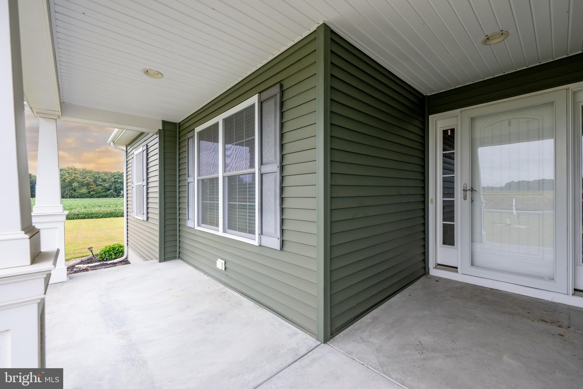 17002 Oak Road Bridgeville, DE 19933 - Photo 22 of 33 a view of house with backyard and glass windows