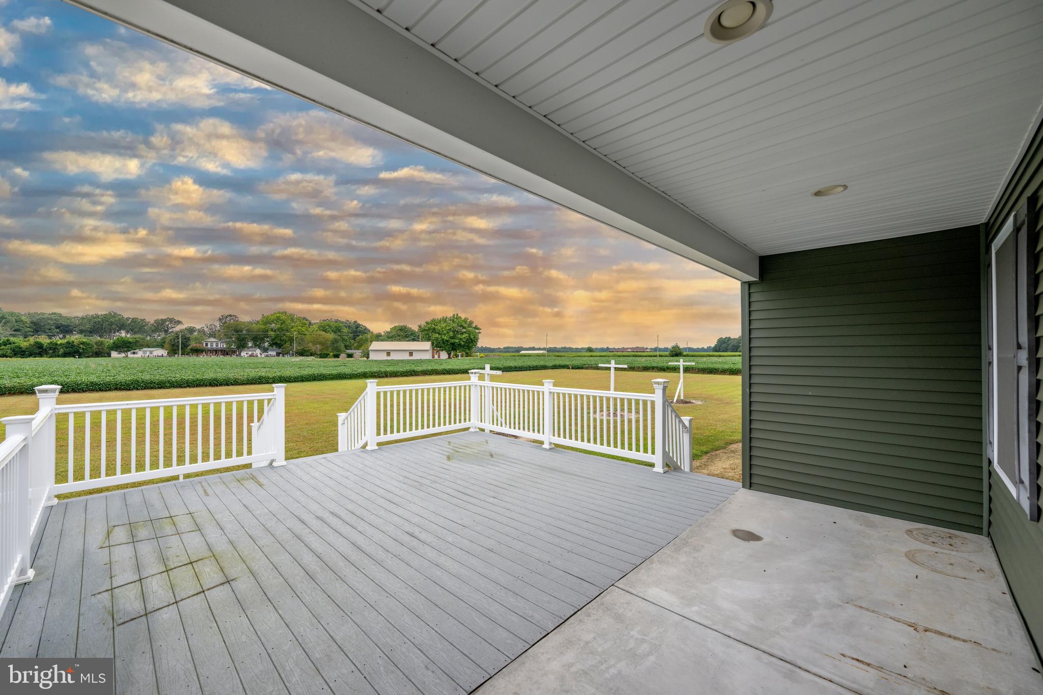 17002 Oak Road Bridgeville, DE 19933 - Photo 25 of 33 a view of a balcony with floor to ceiling windows with wooden floor