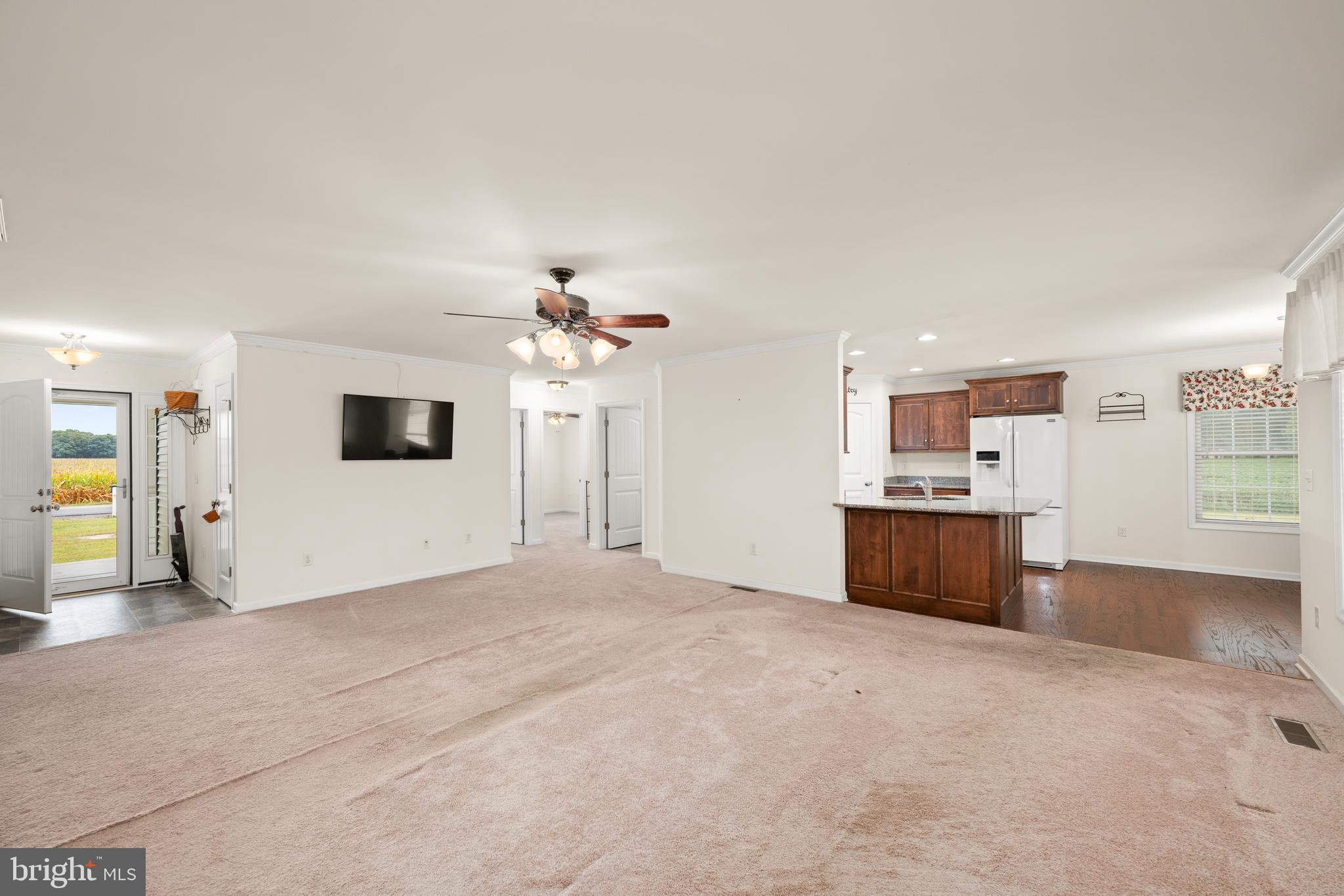 17002 Oak Road Bridgeville, DE 19933 - Photo 5 of 33 a view of a livingroom with a kitchen