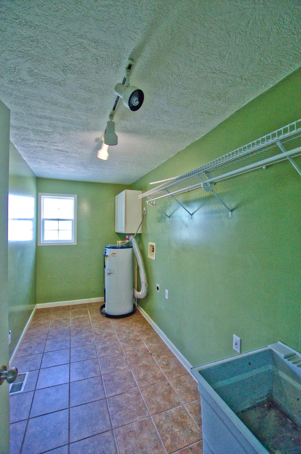 986 McClain Road Morrison, TN 37357 - Photo 16 of 19 a bathroom with a sink and a mirror