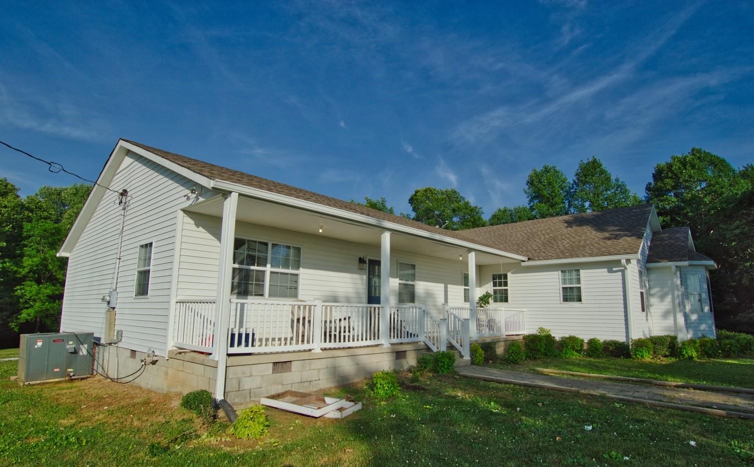 986 McClain Road Morrison, TN 37357 - Photo 6 of 19 front view of a house with a yard