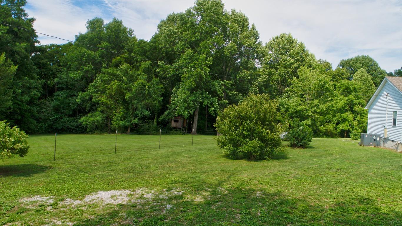 986 McClain Road Morrison, TN 37357 - Photo 9 of 19 a view of grassy field with trees