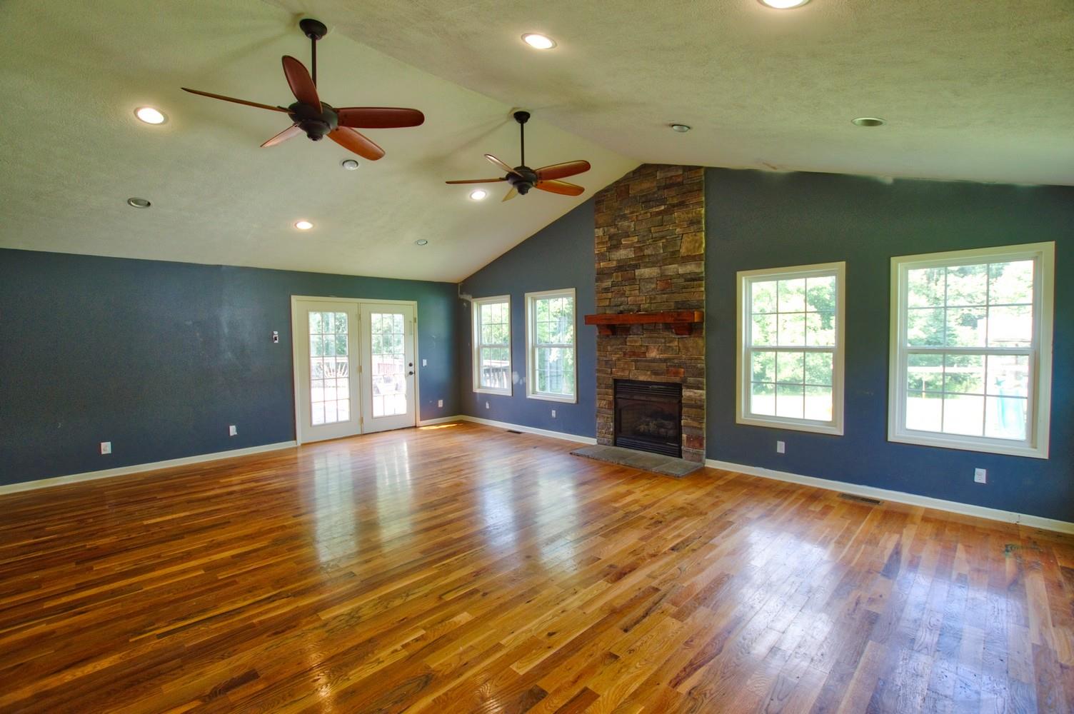 986 McClain Road Morrison, TN 37357 - Photo 10 of 19 a view of empty room with wooden floor and fan