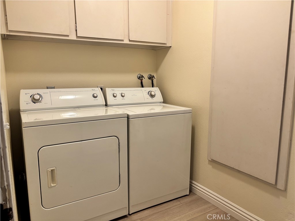 81 Stanford Court, Unit 67 Irvine, CA 92612 - Photo 30 of 30 a utility room with dryer and washer