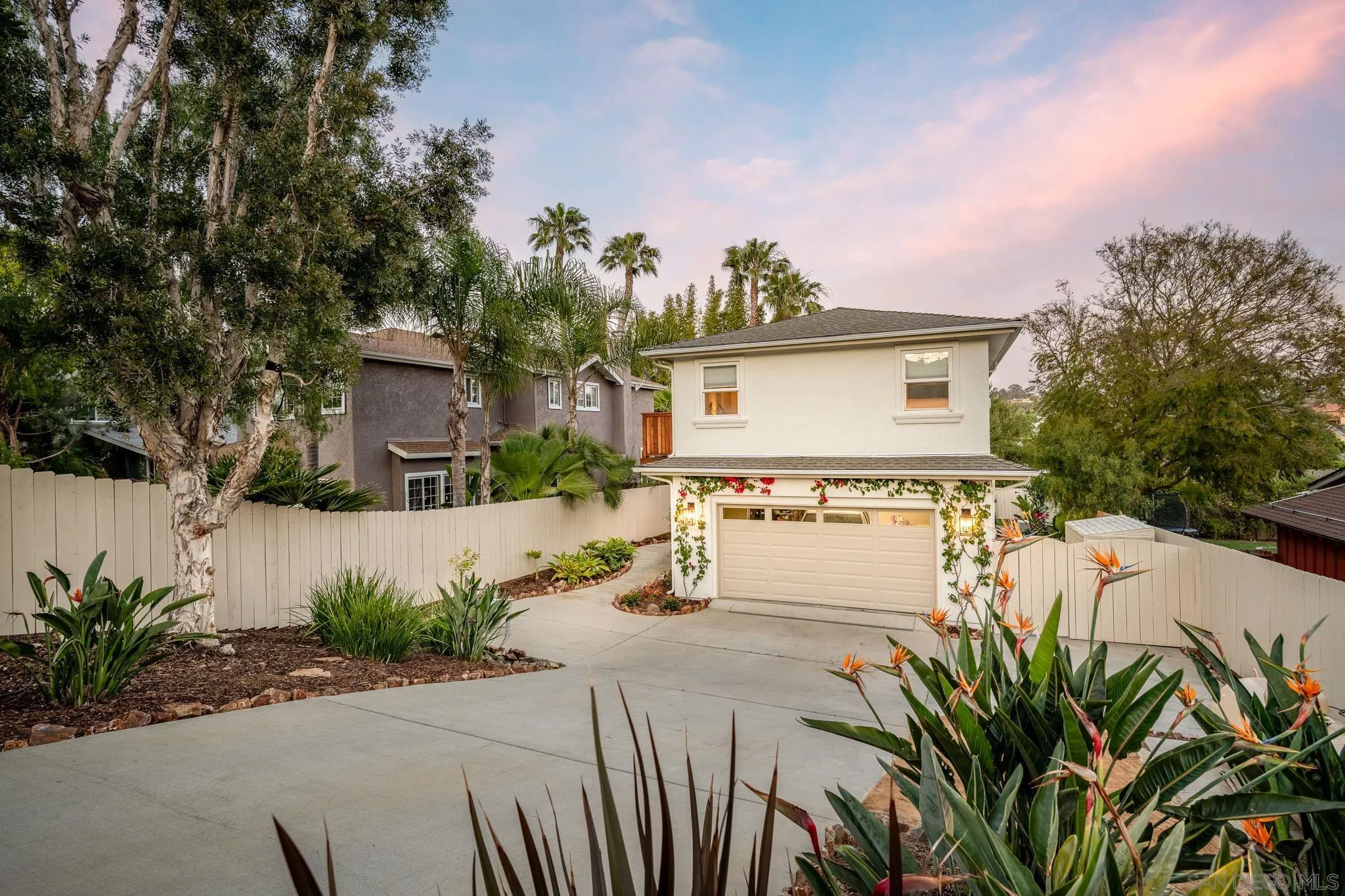 339 Rancho Santa Fe Road Encinitas, CA 92024 - Photo 2 of 36 a front view of a house with garden