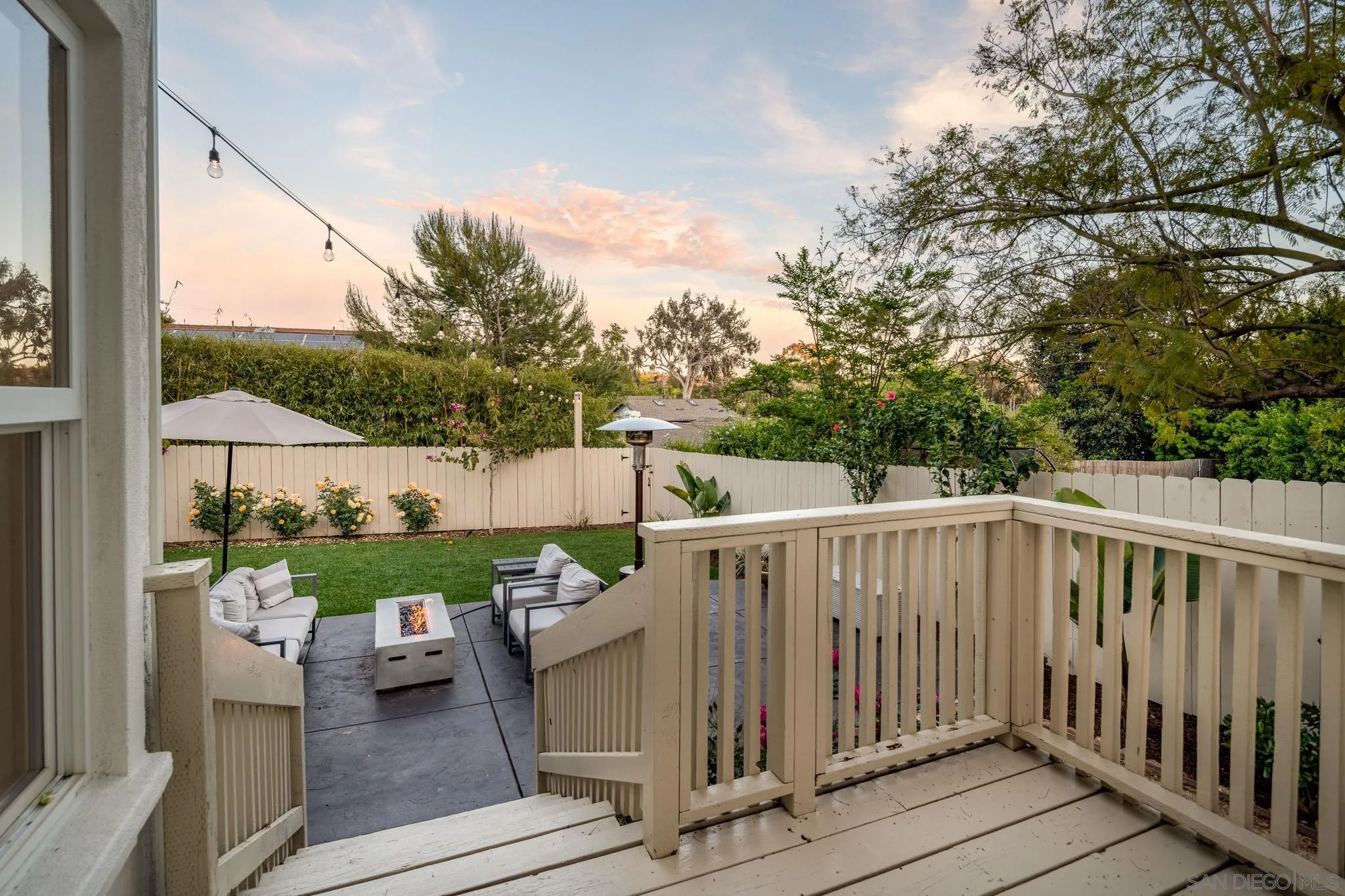 339 Rancho Santa Fe Road Encinitas, CA 92024 - Photo 24 of 36 a view of a wooden deck and a backyard