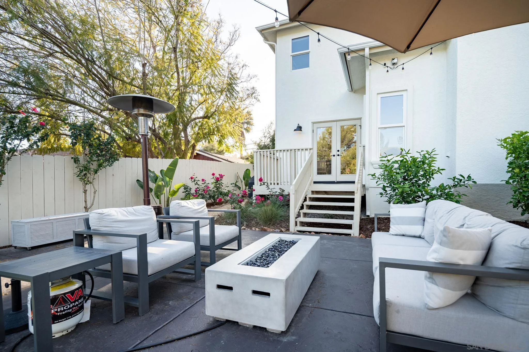 339 Rancho Santa Fe Road Encinitas, CA 92024 - Photo 27 of 36 a balcony with furniture and a potted plant