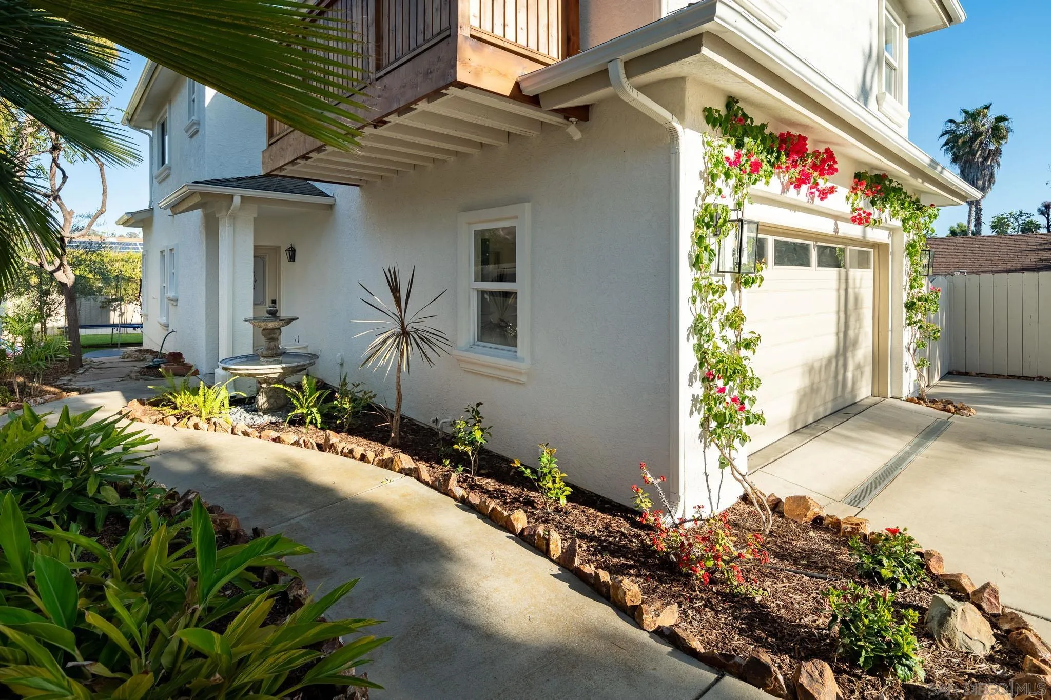 339 Rancho Santa Fe Road Encinitas, CA 92024 - Photo 30 of 36 a view of a house with potted plants