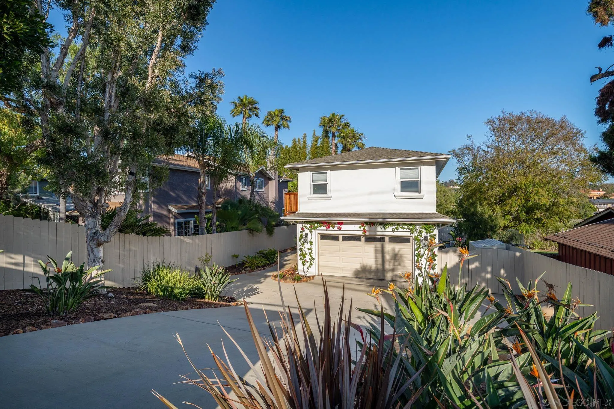 339 Rancho Santa Fe Road Encinitas, CA 92024 - Photo 31 of 36 a view of a house with a yard and garden