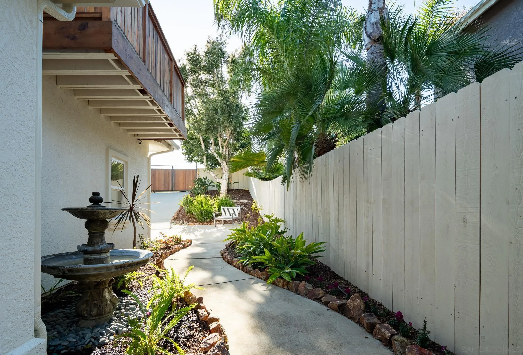 339 Rancho Santa Fe Road Encinitas, CA 92024 - Photo 34 of 36 a view of a fountain in the backyard of a house