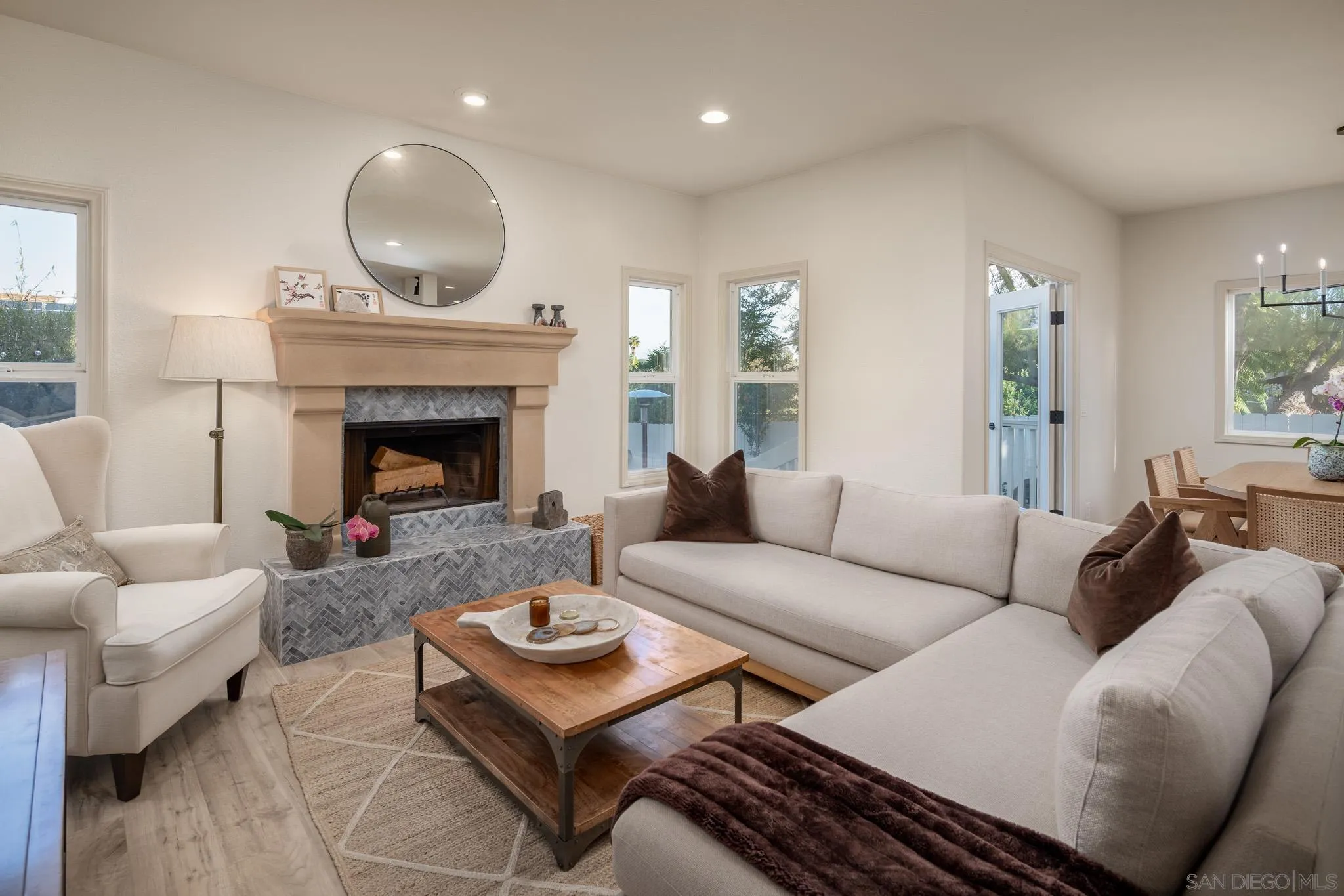 339 Rancho Santa Fe Road Encinitas, CA 92024 - Photo 4 of 36 a living room with furniture and a fireplace