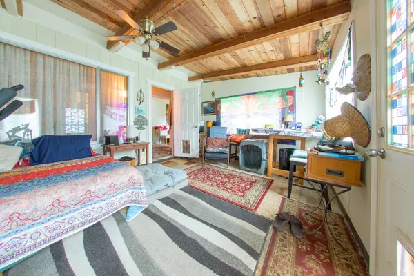 a bed room with a bed and a table
