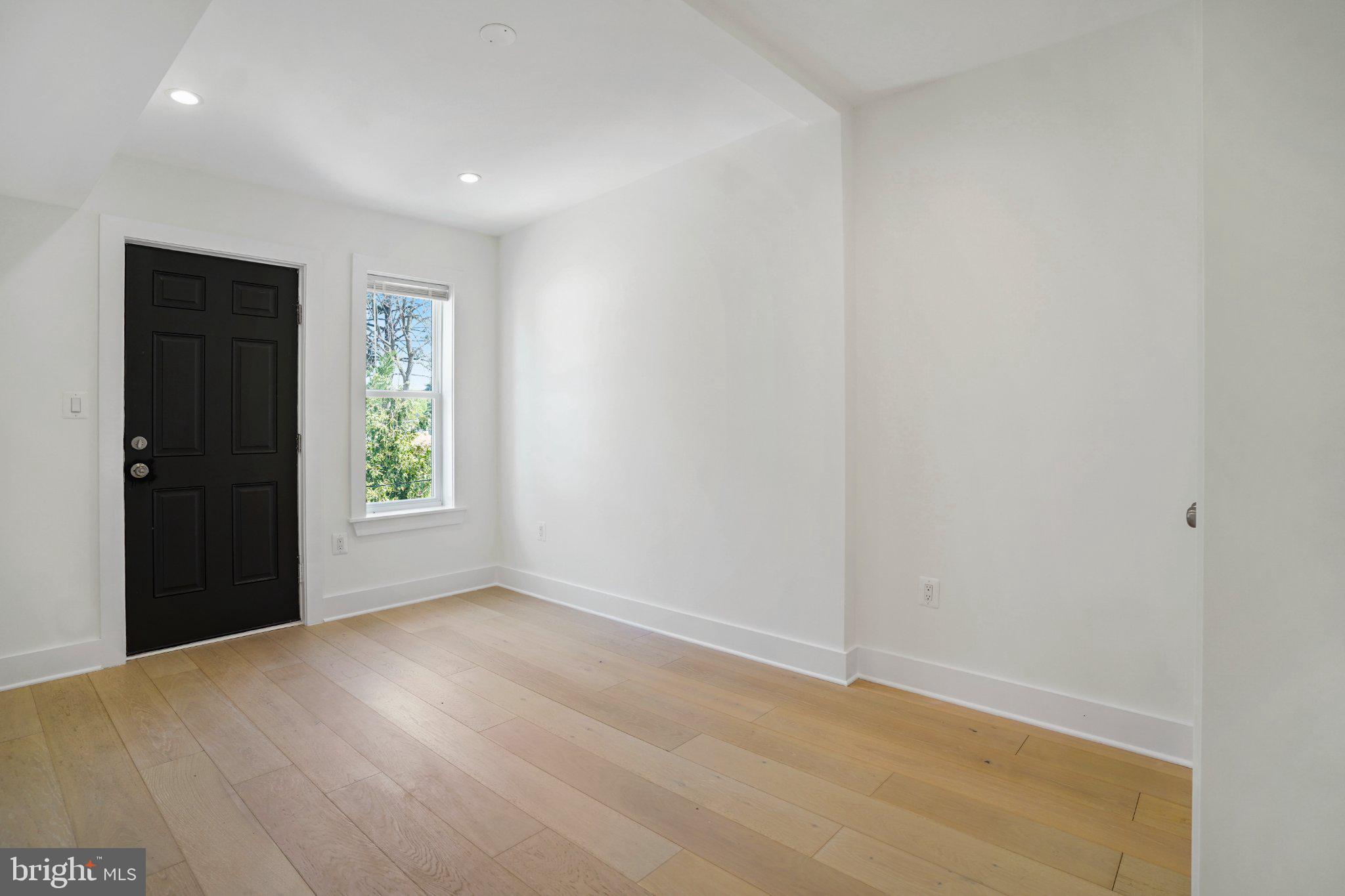 112 V Street Northeast Washington, DC 20002 - Photo 16 of 25 a view of an empty room with a window