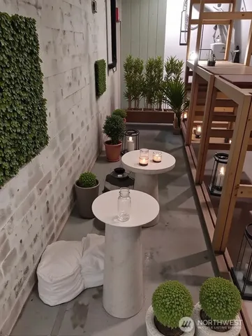 a view of a porch with furniture