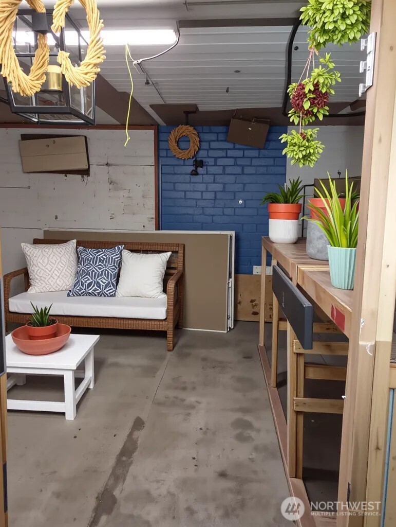 14607 Union Avenue Southwest Lakewood, WA 98498 - Photo 20 of 40 a view of dinning room with furniture and a potted plant