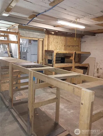 a kitchen with a sink and a refrigerator