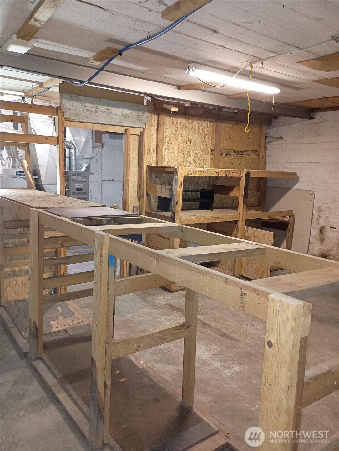 14607 Union Avenue Southwest Lakewood, WA 98498 - Photo 22 of 40 a kitchen with a sink and a refrigerator