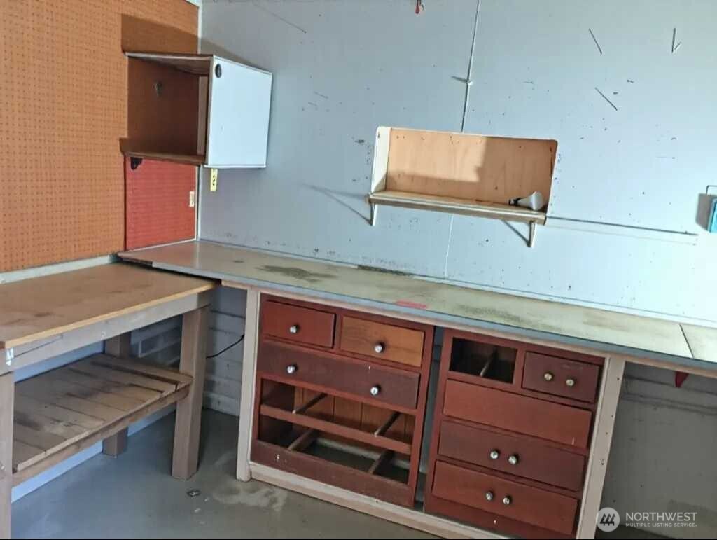 14607 Union Avenue Southwest Lakewood, WA 98498 - Photo 25 of 40 a kitchen with a sink and a microwave